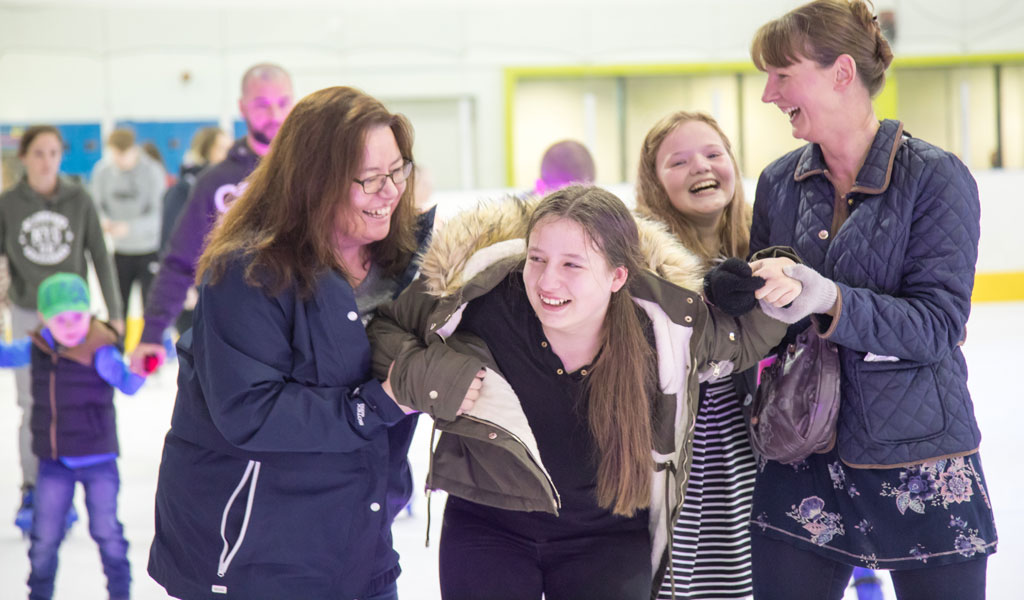 Image of a family skating